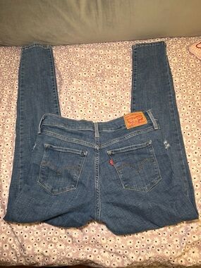 Levi’s 311 Shaping Skinny Jeans Women’s Size 28 Blue Distressed Stretch Denim